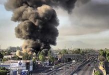 Incendio en planta de neumáticos de Cerrillos lleva más de 24 horas activo: suspenden clases y autoridades emiten alerta sanitaria
